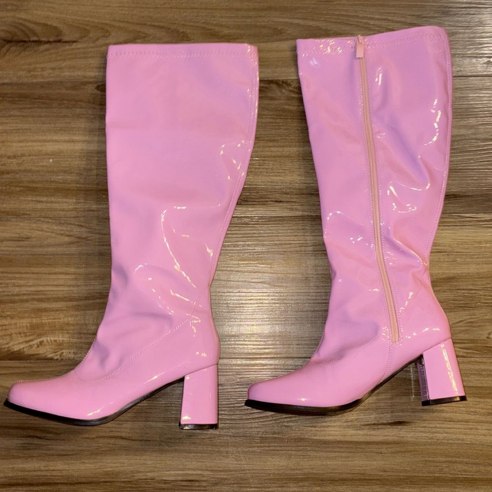 Baby pink patent leather knee high heeled boots